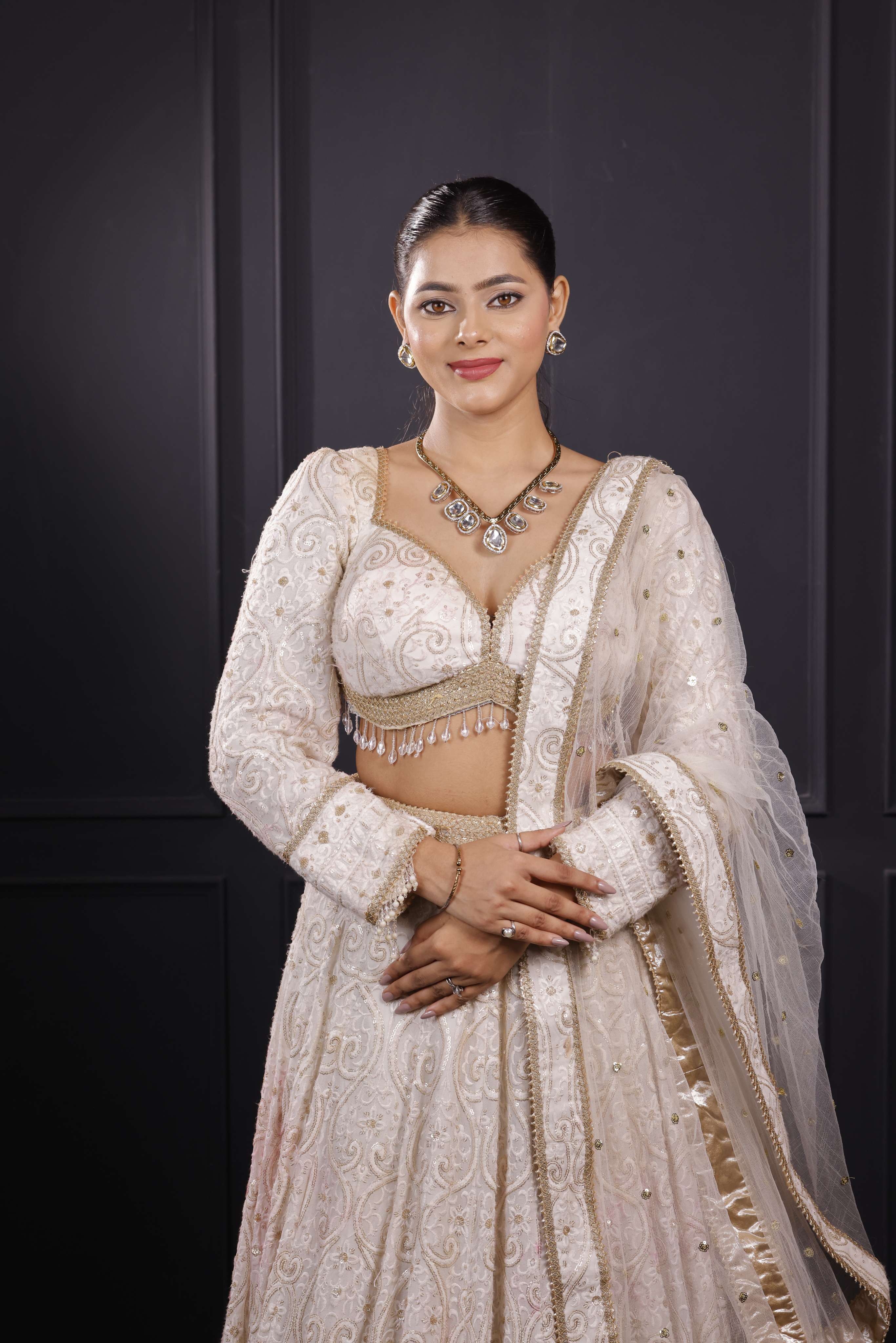 Golden dropping Hasli Set with Studs