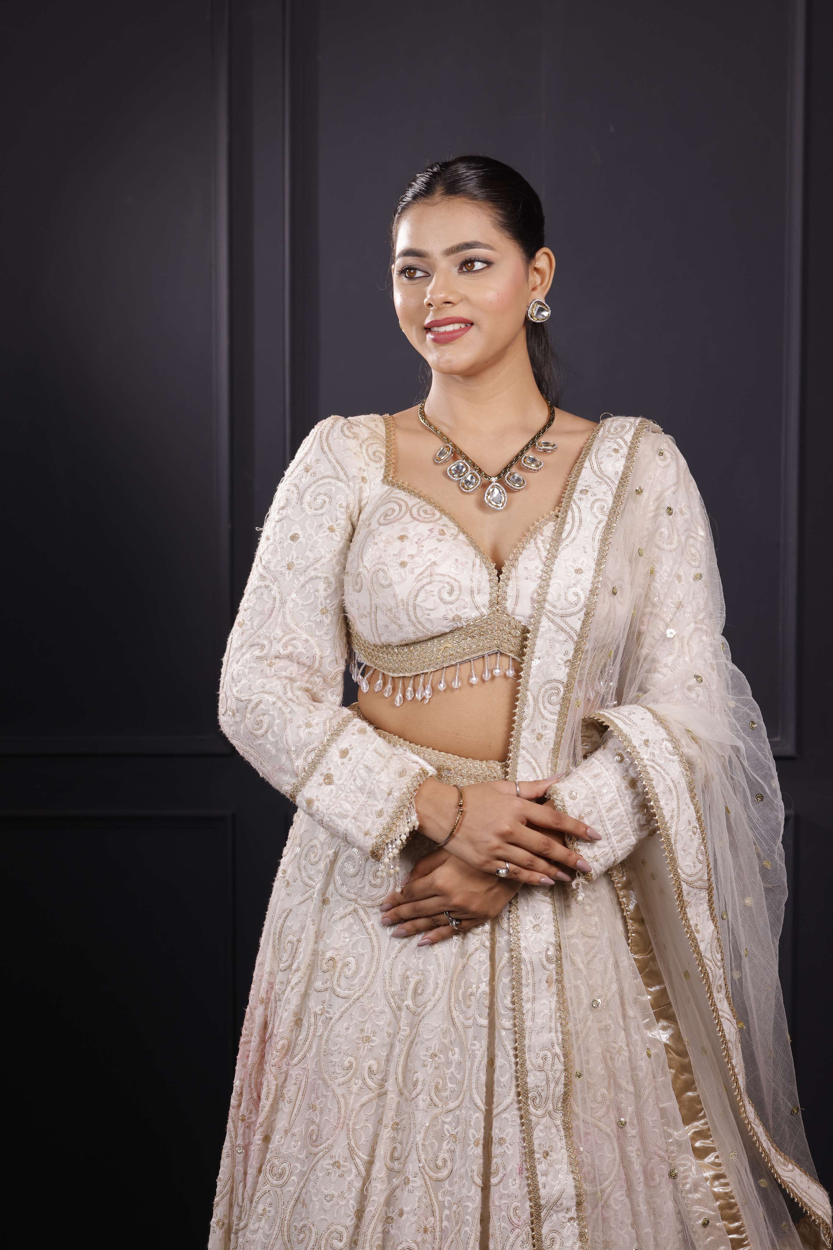 Golden dropping Hasli Set with Studs