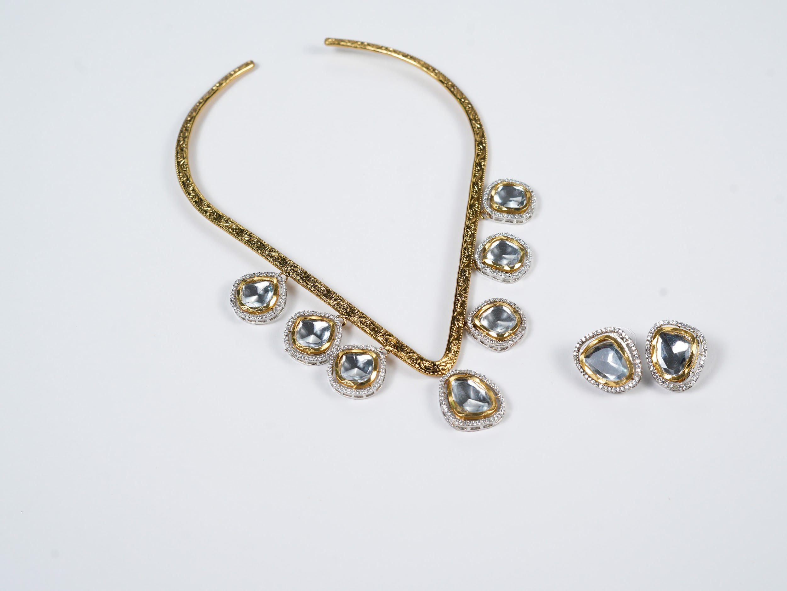 Golden dropping Hasli Set with Studs